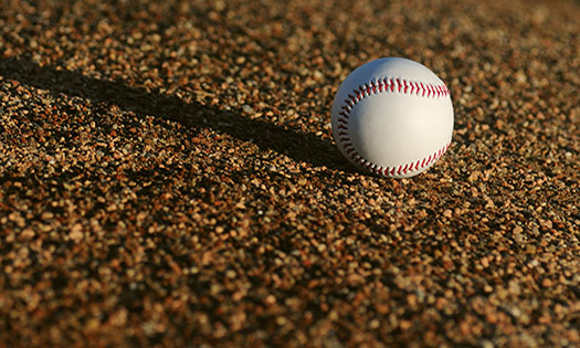 A baseball on the field, comparing sign stealing to cyber threat intelligence and threat modeling