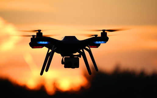 drone-flying-at-sunset_515 drone-flying-at-sunset_515