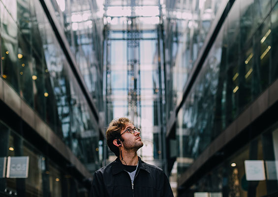 IT Career Opportunities A man walks in a city and looks around at all the opportunities