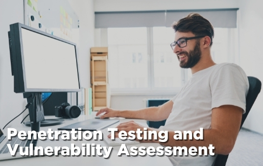 Man working on computer with the text Penetration Testing and Vulnerability Assessment