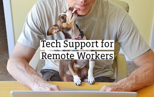 A help desk technician works from home with his dog in his lap