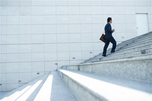 Man Walking Up Steps