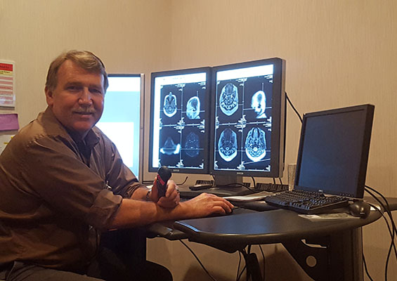 Tony Phillips views an MRI on screen