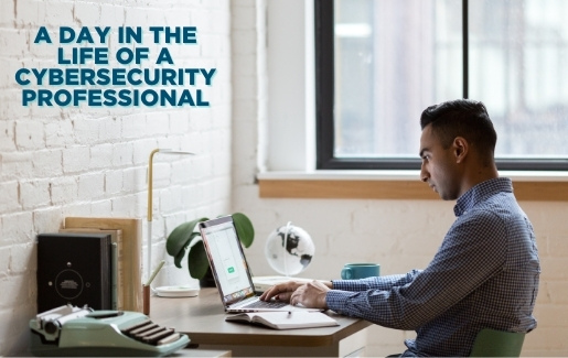 A cybersecurity professional working on a computer.